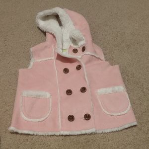 Pink vest with hood.